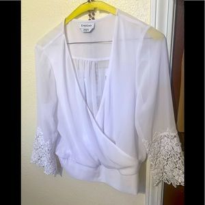 BEBE classy and sexy mid sleeve w/lace white blouse.